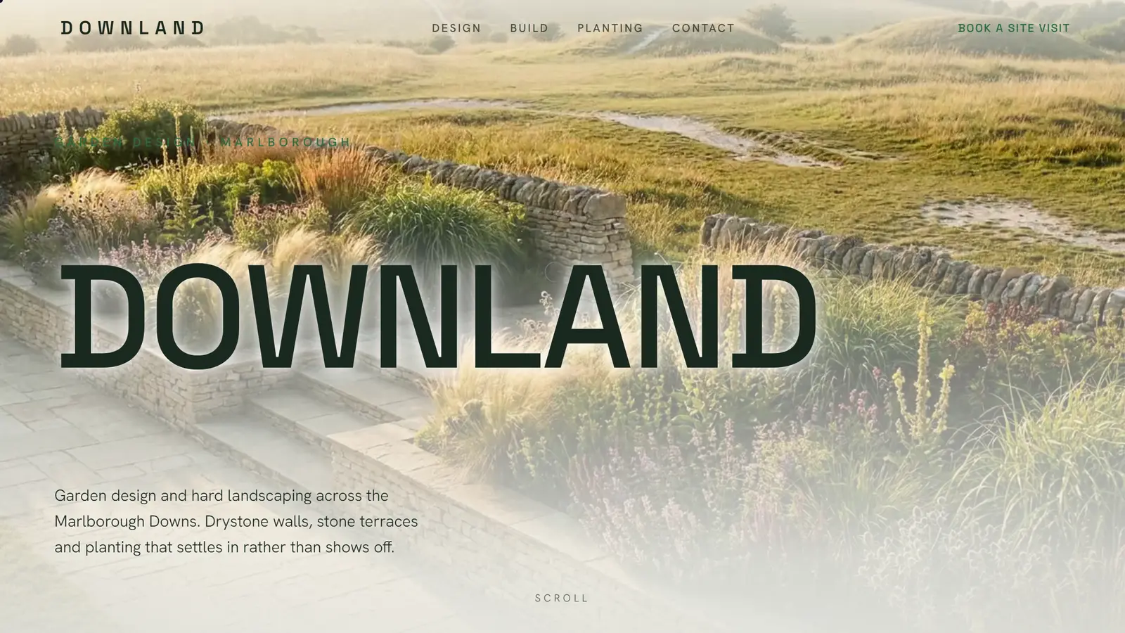 The Downland home page: a stone terrace and planted border running out into the Marlborough Downs at first light, with the name set large across it.